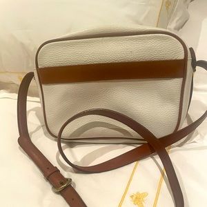 Beautiful white leather purse with adjustable shoulder strap!
